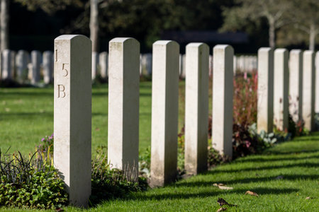 Ehrenfriedhof World War II military cemetery in Cologne. White gravestones of the cemetery of honor...