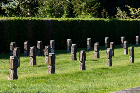 Ehrenfriedhof World War II military cemetery in Cologne. White gravestones of the cemetery of honor...