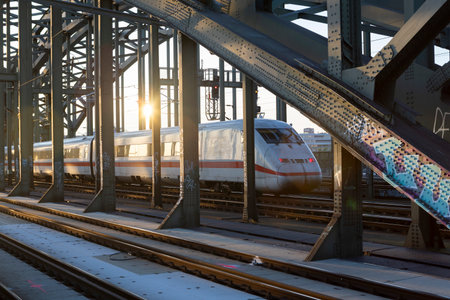 Cologne Cathedral is a famous monument of German Catholicism and Gothic architecture and a symbol of Germany. Hohenzollern Bridge is one of the most important railway junctions in Europeの写真素材
