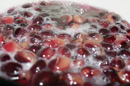 Grape compote boil and boils on the stoveの写真素材