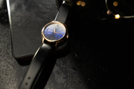 Wrist watch on a black background. close-up. selective focus.の写真素材