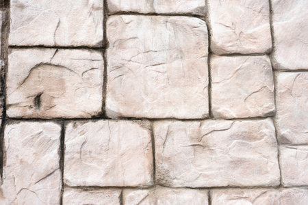 stone wall as a background or texture. antique wall. pink stone. building. architectureの写真素材