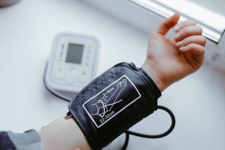 Measuring the pulse pressure using a tonometerの写真素材