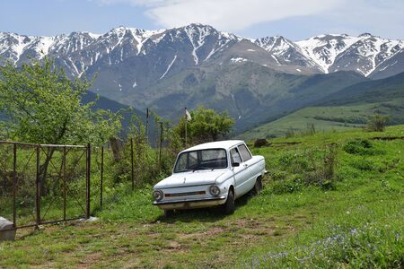 Old car on the background of mountains, Tatev, Armeniaのeditorial素材