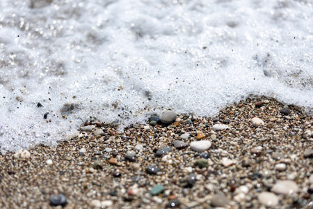 sea pebbles on the beach, the waves of the sea
