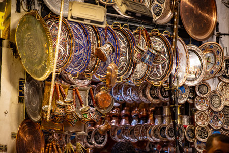 Showcase of the gift shop with traditional brass and copperware and ceramics in Grand Bazaar, Istanbul, Turkeyの写真素材