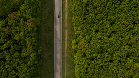 Beautiful long road top view shot from the droneの写真素材