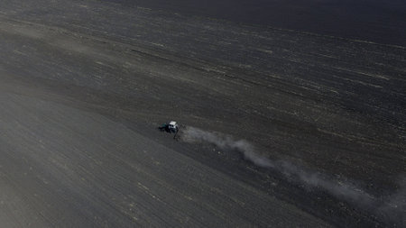 Beautiful aerial photography of tractor in summerの写真素材