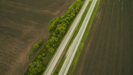Beautiful long road scenery shot from the droneの写真素材