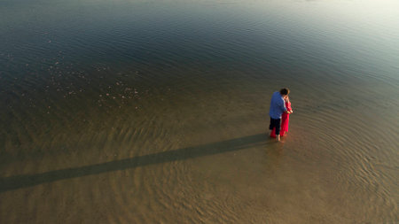 Beautiful family couple on a walk view from aboveの写真素材