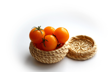 little orange tomatoesの写真素材