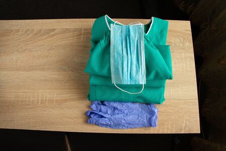 medical uniform set folded on isolated background nurseの写真素材