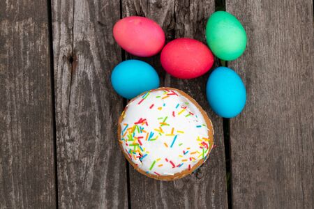 easter eggs lie on a wooden board and easter eggs