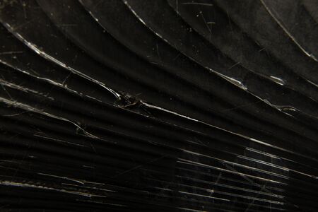 cracked glass phone macro photo as backgroundの写真素材