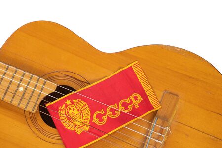 Red USSR flag on a stick and an guitar on a white background from Soviet timesの写真素材