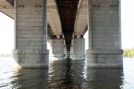 old kaydat bridge across the Dnieper River in the city of Dnieperの写真素材