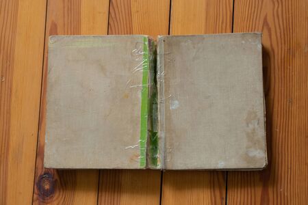 books lie on a wooden table top view downの写真素材