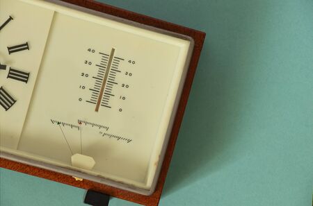 soviet table clock in a wooden frame lie on the table