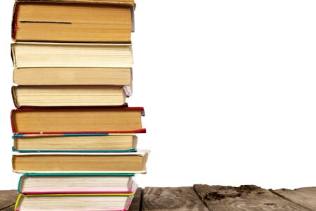 a stack of old books on an isolated backgroundの写真素材