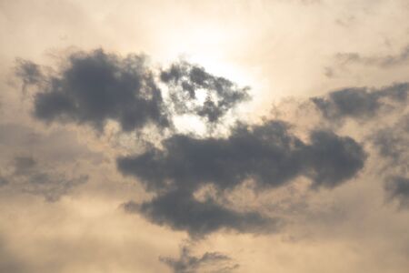 cloudy sky on a sunny day as a backgroundの写真素材