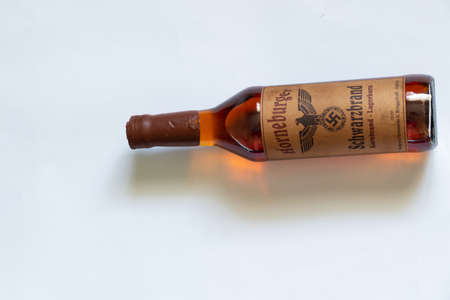 Ukraine, Dnipro - April 05, 2020. horneburger 1939 whiskey of the third reich found in the cellar lies on the tableのeditorial素材