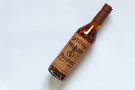 Ukraine, Dnipro - April 05, 2020. horneburger 1939 whiskey of the third reich found in the cellar lies on the tableのeditorial素材