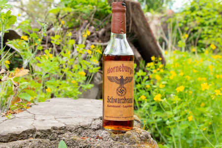 Ukraine, Dnipro - April 06, 2020. horneburger 1939 whiskey of the third reich found in the cellar lies streetのeditorial素材