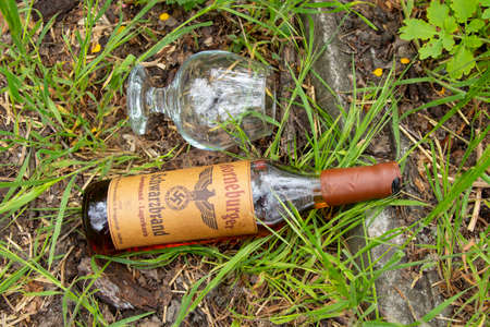Ukraine, Dnipro - April 06, 2020. horneburger 1939 whiskey of the third reich found in the cellar lies streetのeditorial素材
