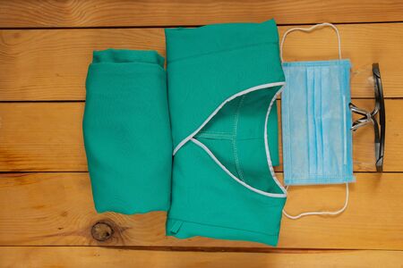 medical uniform set folded on an isolated background nurseの写真素材
