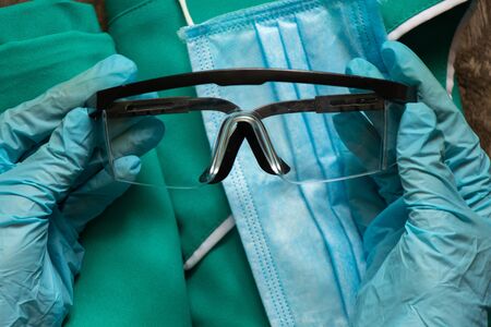 medical uniform set folded on an isolated background nurseの写真素材