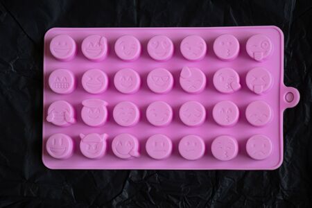 silicone pink push up form with many smilesの写真素材