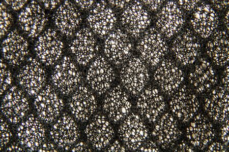 gray fine mesh air conditioner macro photoの写真素材