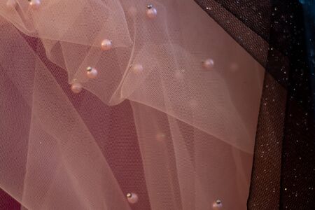 black-pink fabric with sparkles as a backgroundの写真素材