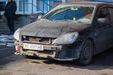 Dnipro, Ukraine - December 31, 2019. A car without a bumper stands on the street in the cities of the Dnieper in Ukraineのeditorial素材