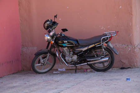 Sharm El Sheikh, Egypt - December 18, 2019. motorcycle stands outside in the afternoon