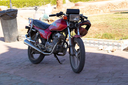 Sharm El Sheikh, Egypt - December 18, 2019. DAYUN -150 motorcycle stands outside in the afternoonのeditorial素材