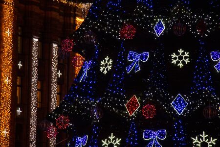 Christmas elegant tree in a park in the city of Dnieperの写真素材
