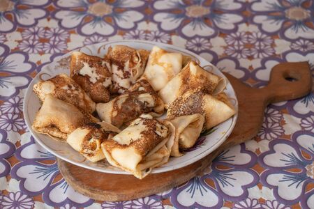 homemade pancakes in the kitchen on the tableの写真素材