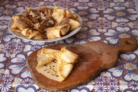 homemade pancakes in the kitchen on the tableの写真素材