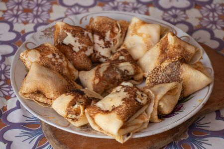 homemade pancakes in the kitchen on the tableの写真素材