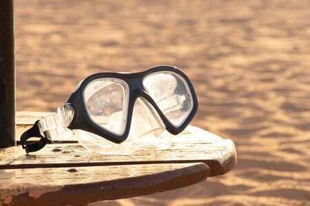 mask for diving lies sand in egypt close up in the sunの写真素材