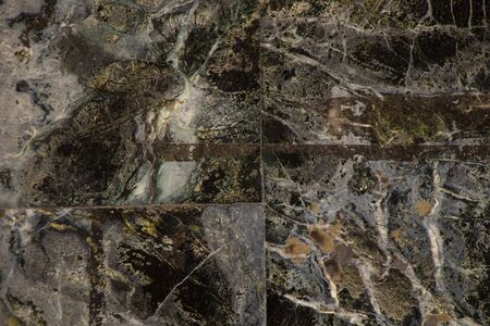 dark gray marble wall as backgroundの写真素材