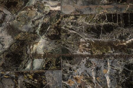 dark gray marble wall as backgroundの写真素材