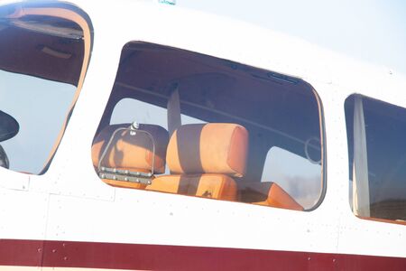 small old plane stands at the airport in the city of Dnieperの写真素材