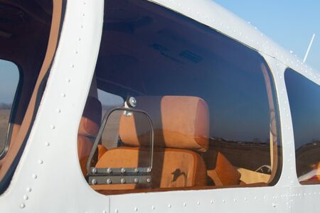 small old plane stands at the airport in the city of Dnieperの写真素材