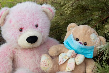 medical mask on a teddy bear close-up