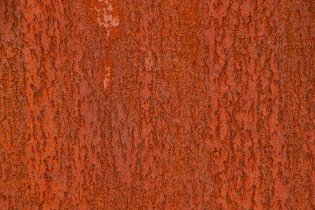 background of old rusty metal wall close upの写真素材