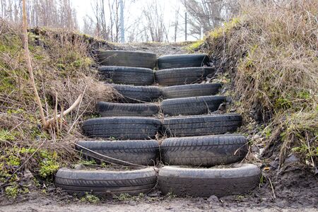 homemade wheel stairs on the street in the fall in the afternoonの写真素材