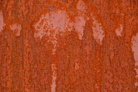 background of old rusty metal wall close upの写真素材