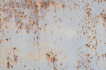 background of old rusty metal wall close upの写真素材